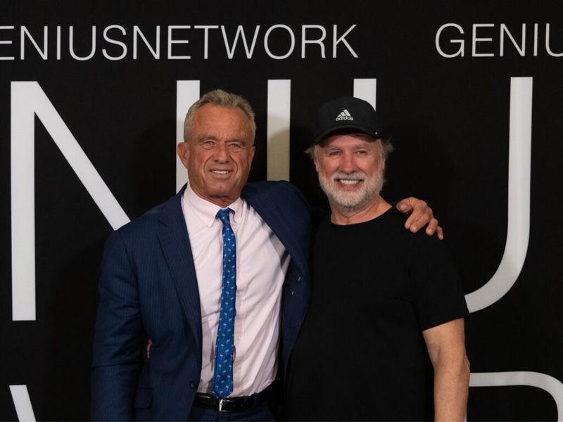 Randy Long and Robert F. Kennedy Jr. posing together at a Genius Network event